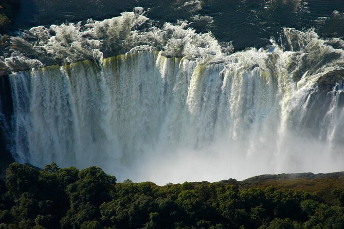 15 minutes scenic helicopter flight above Victoria Falls-Zimbabwe - Getting picked up, staying comfortable, and getting back again
