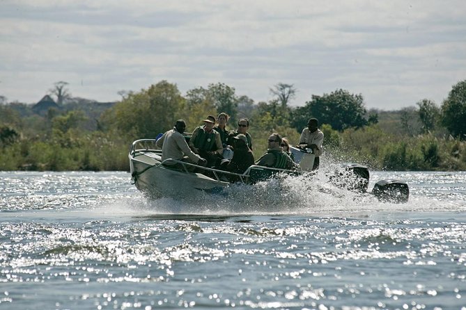 Livingstone island Morning Breezer ( swim above the falls) - Getting to Livingstone Island by Twin-Engine Boat on the Zambezi