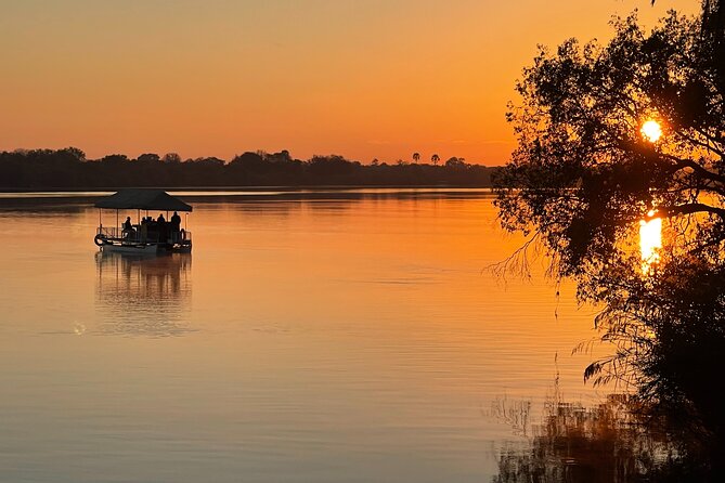 Private Sunrise Cruise on the Zambezi River - Cruising past Victoria Falls mist on the upper Zambezi