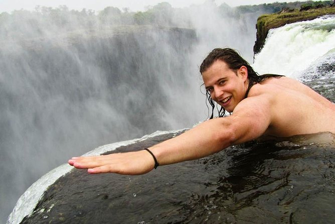 Small-Group Devil's Pool and Livingstone Island Tour - Devil’s Pool swimming: what you actually do at the ledge