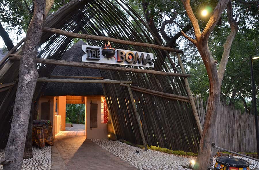 Victoria Falls: Boma Dinner and Drum Show - Arriving at The Boma, chitenge wrap and face paint
