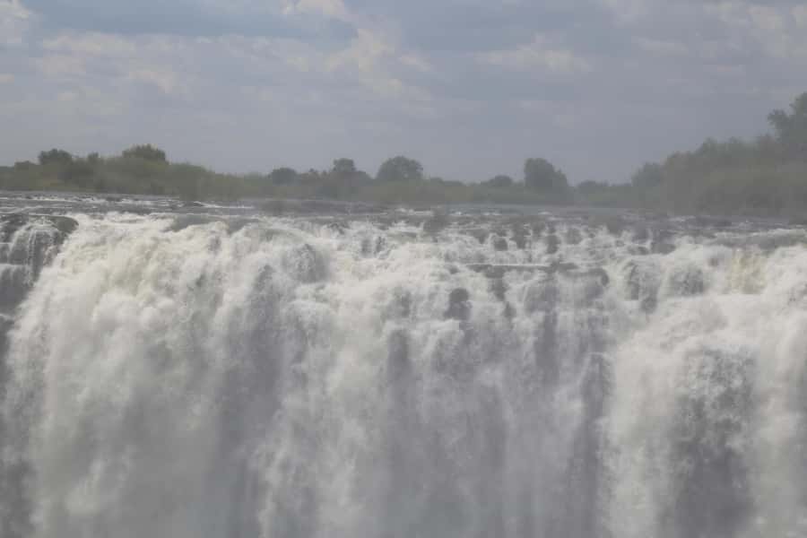 Victoria Falls: Private Guided Tour of the Waterfalls - Photo and comfort strategy for a wet, misty day