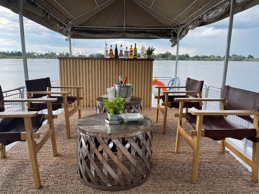 Victoria Falls: Private Sunset Cruise on the Zambezi River - Canapés, cocktails, and the vibe shift you’ll notice fast