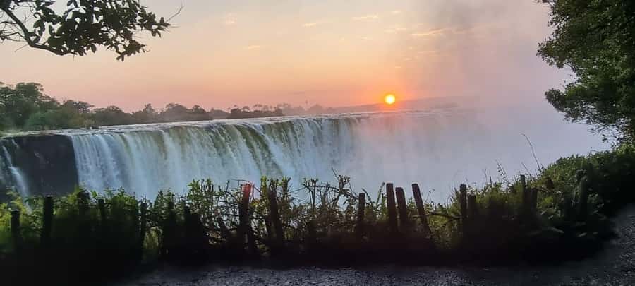 Victoria Falls Scenic Day Tour with Lunch & Helicopter Tour - Lunch at Lookout Café or Baines, with gorge views and guide help for photos