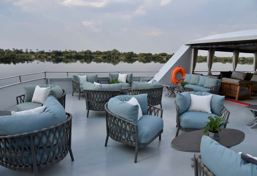 Victoria Falls Scenic Guided Tour with Sunset Boat Cruise - Victoria Falls Bridge and historical islands, seen from the river
