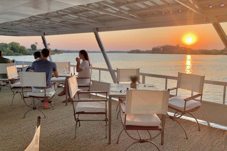 Victoria Falls: Zambezi River Relaxing Sunset Boat Cruise - Cruising the Upper Zambezi: The River Border, the Mist, and Real Wildlife Time