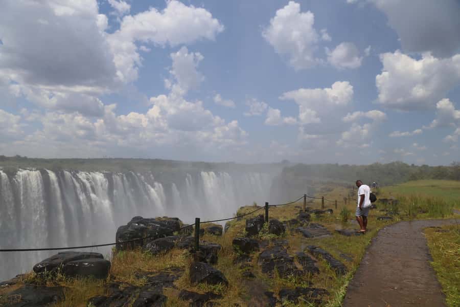 Zimbabwe & Zambia: Guided Tour of the Falls from Both Sides - What to bring: passport, visa, rain protection, and comfort items that save your trip